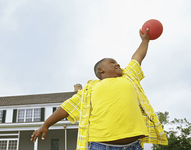 kid playing basketball